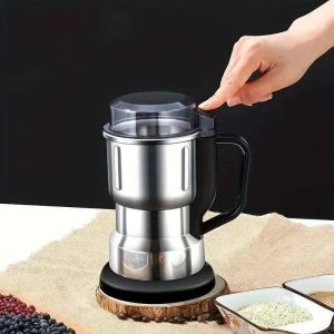 Moedor elétrico compacto em aço inoxidável com pega ergonómica, ideal para moer grãos de café, condimentos, pimentas, frutos secos e cereais de forma rápida e prática.